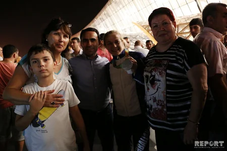 Azərbaycanın olimpiya yığması Vətənə dönüb - FOTOREPORTAJ