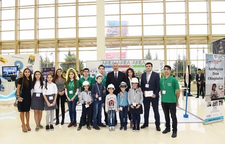 President Ilham Aliyev views Bakutel 2018 exhibition