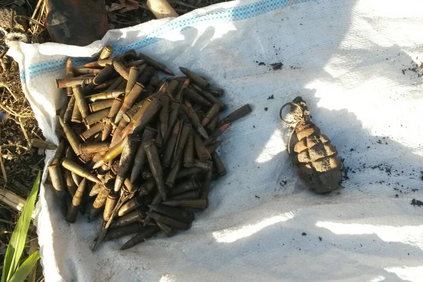 Bakıda zibillikdən qumbara və xeyli sayda patron tapılıb