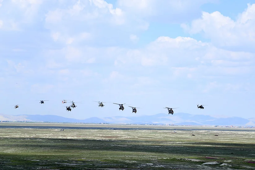 Azerbaijani military pilots perform tasks in international training