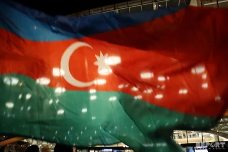 Azərbaycanın olimpiya yığması Vətənə dönüb - FOTOREPORTAJ