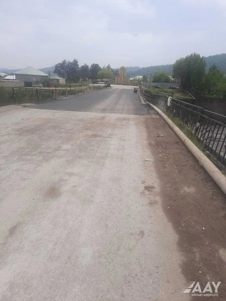 Qubada sel sularının qəzalı vəziyyətə saldığı körpü bərpa olunub