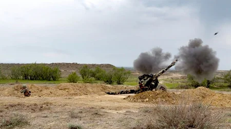 Artillery units carry out combat firing