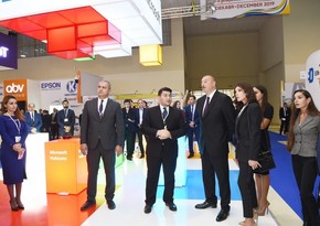 President Ilham Aliyev views Bakutel 2018 exhibition