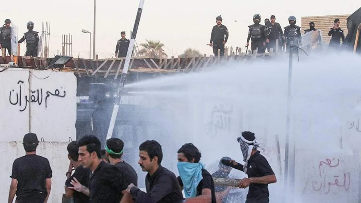 Iraqi police fire water cannon to disperse protesters at Swedish embassy