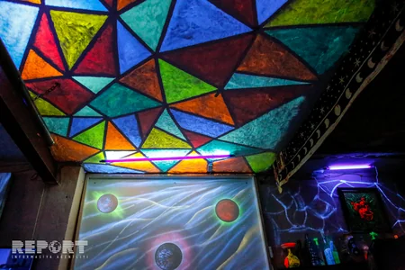 Pictures shining in ultraviolet lamps' light- PHOTOS