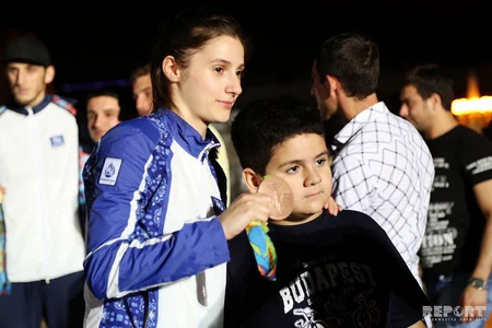 Azərbaycanın olimpiya yığması Vətənə dönüb - FOTOREPORTAJ
