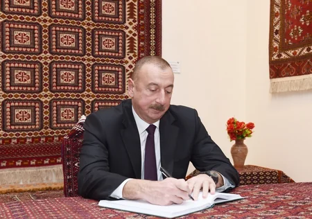 President Ilham Aliyev views Turkmen national carpet museum