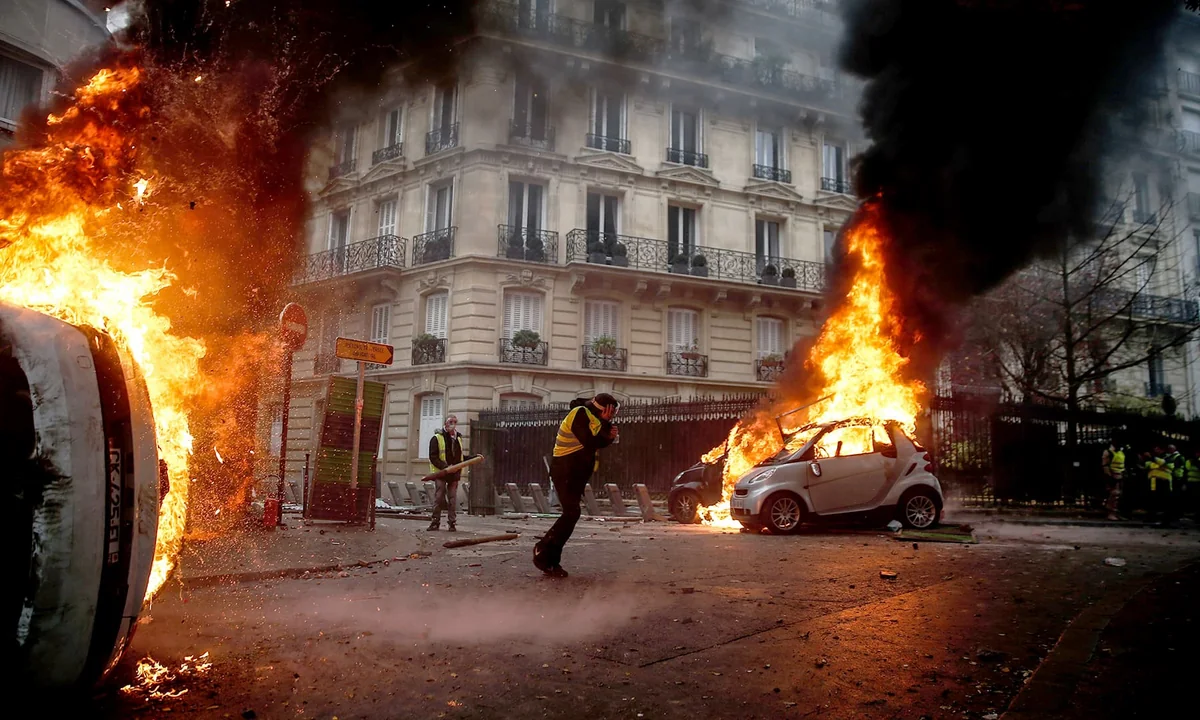 French New Year's celebration marred by widespread car burnings