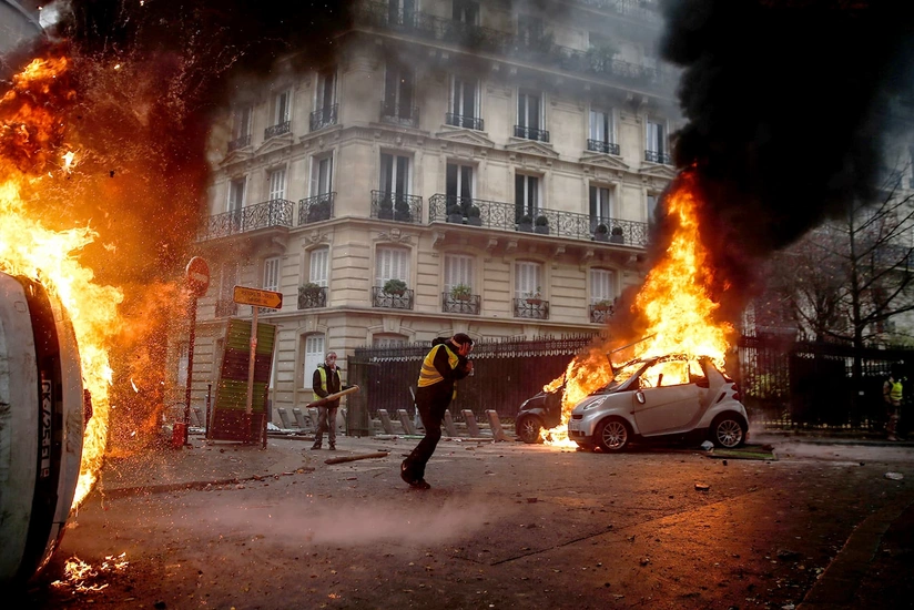 French New Year's celebration marred by widespread car burnings