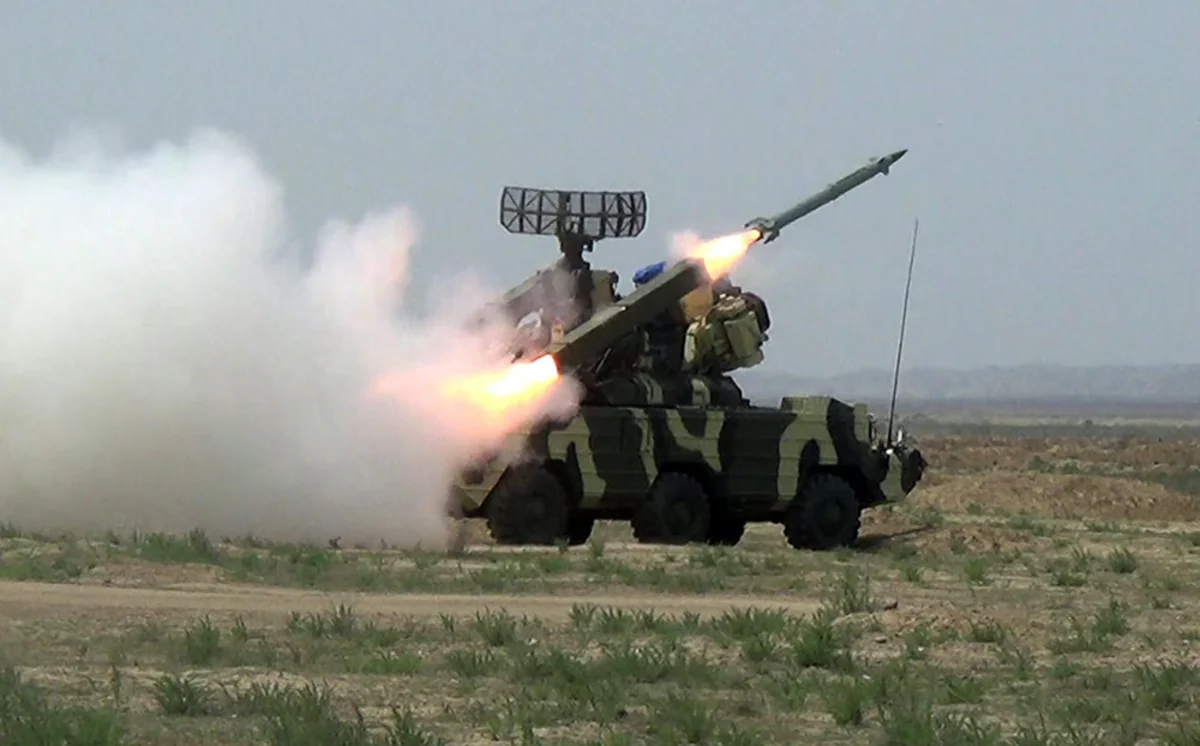 Anti-aircraft missile units conduct live-fire tactical exercises