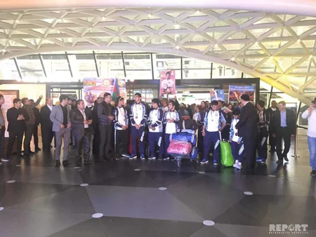 Olimpiadada iştirak etmiş Azərbaycan idmançıları Bakıya qayıdıblar - FOTO