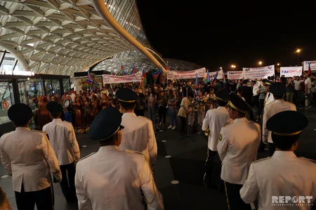 Azərbaycanın olimpiya yığması Vətənə dönüb - FOTOREPORTAJ
