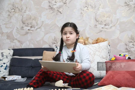 Üçəm anası olan gömrük xidməti mayorunun bir günü - REPORTAJ