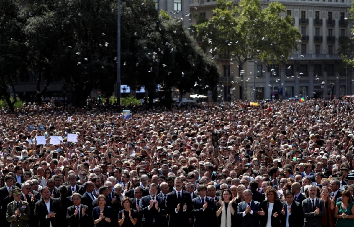 Barcelona holds march of thousands in memory of terrorist attack victims