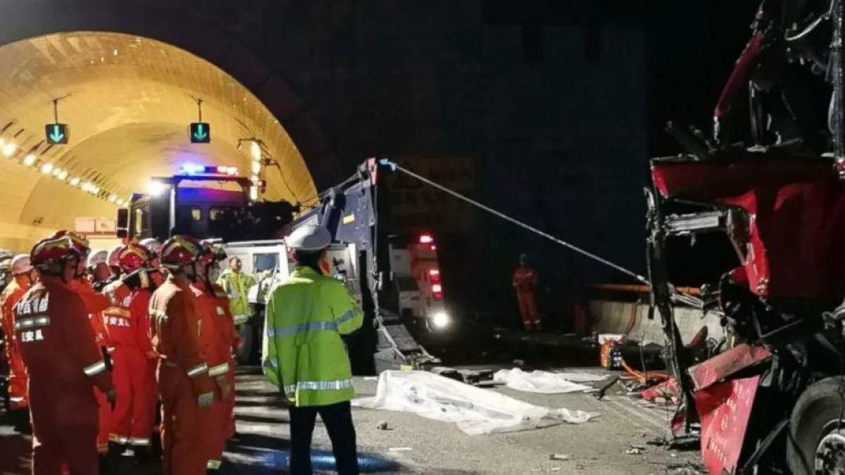 Passenger bus crashes into tunnel wall in north China, killing 14