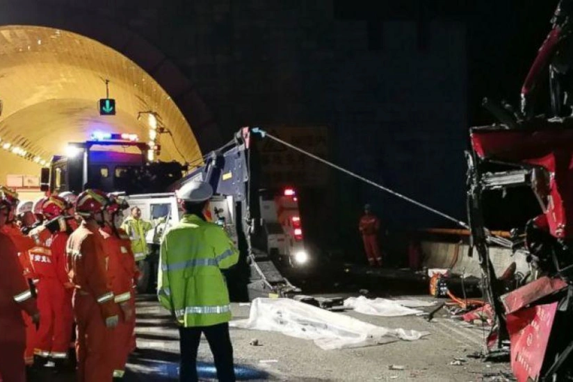 Passenger bus crashes into tunnel wall in north China, killing 14