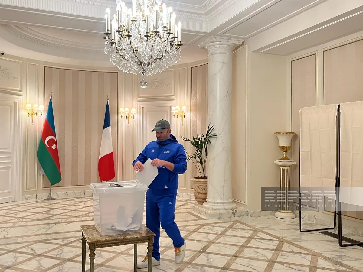 Voting begins at polling station in Paris