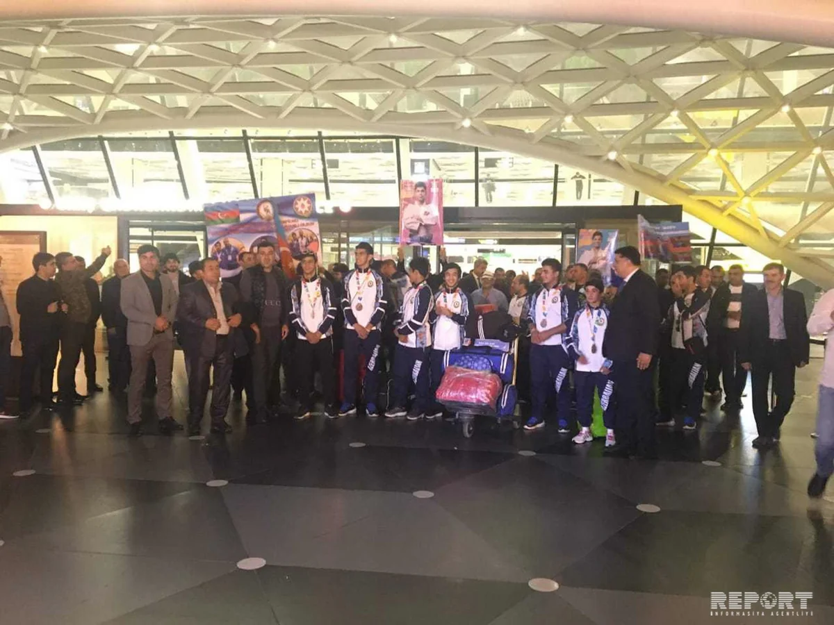 Olimpiadada iştirak etmiş Azərbaycan idmançıları Bakıya qayıdıblar - FOTO