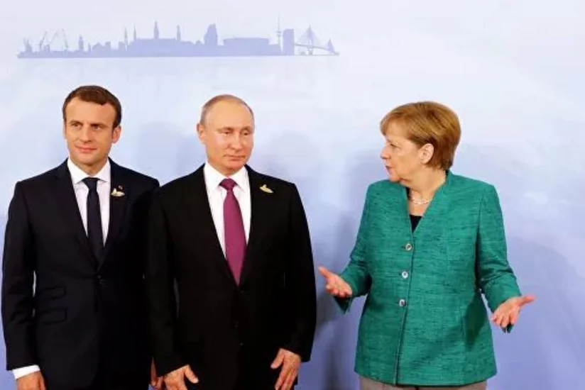 Путин, Меркель и Макрон провели телефонный разговор