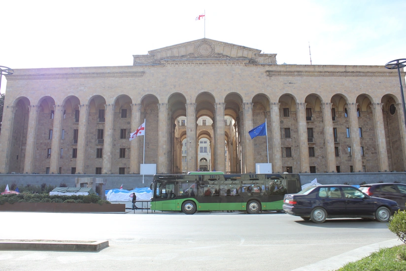 Georgian opposition supporters rally around parliament