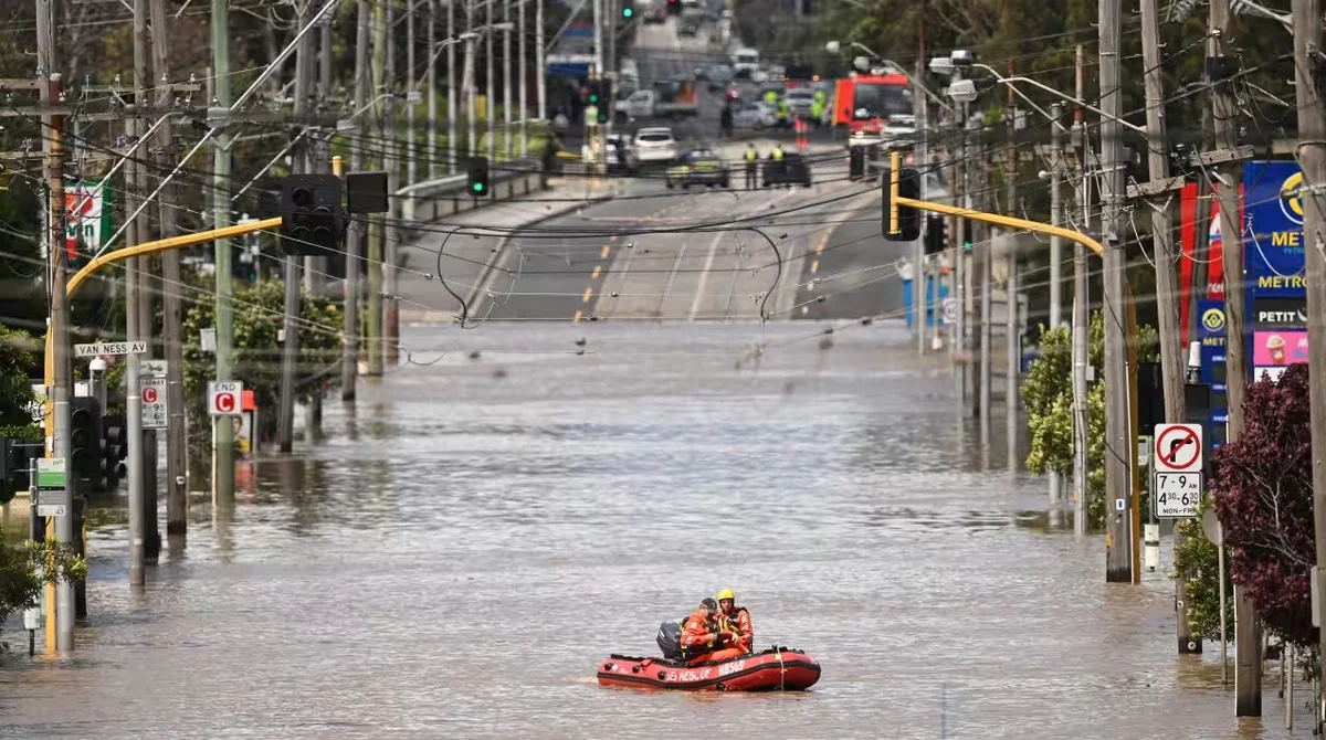 Hundreds of thousands of homes left without power as wild storms and winds spark chaos in Australia