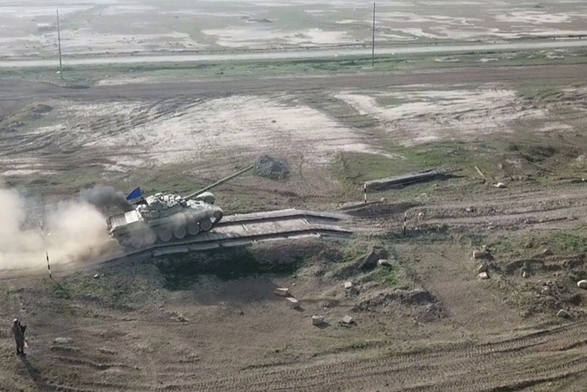 Tank units conduct combat firing