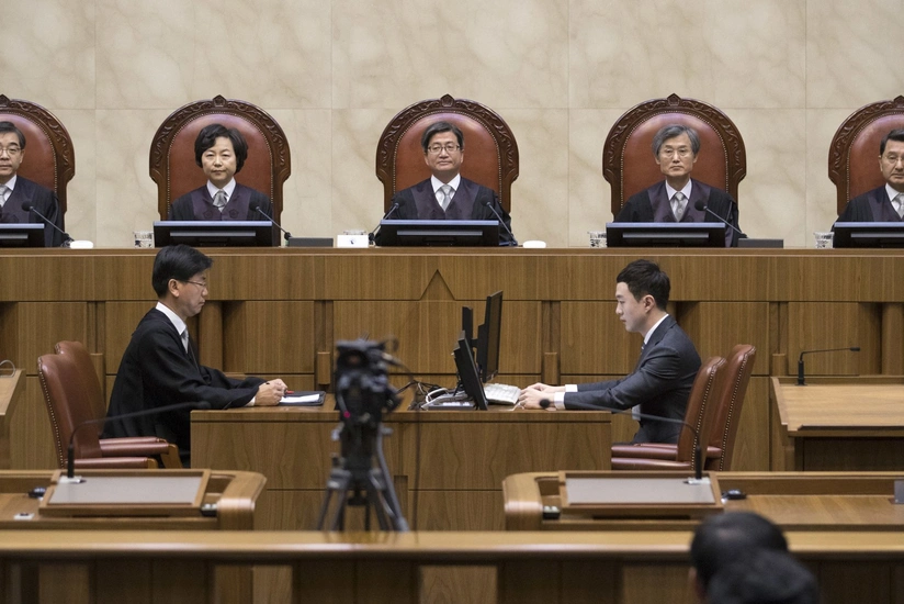 Japenese lawmaker gets 4-year prison term in bribery case