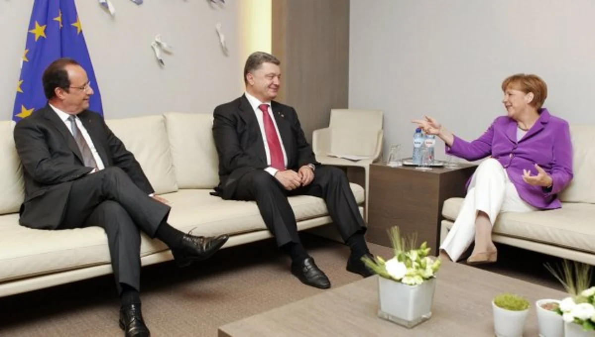 Меркель, Олланд и Порошенко провели встречу перед Маршем единства