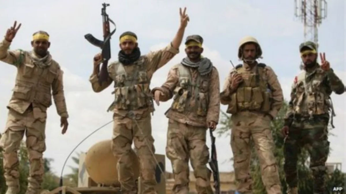 Şiə döyüçülər Tikrit şəhərini tərk edir
