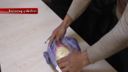 Azyaşlı oğlundan narkotik vasitələr əldə etmək üçün istifadə edən ata saxlanılıb - VİDEO