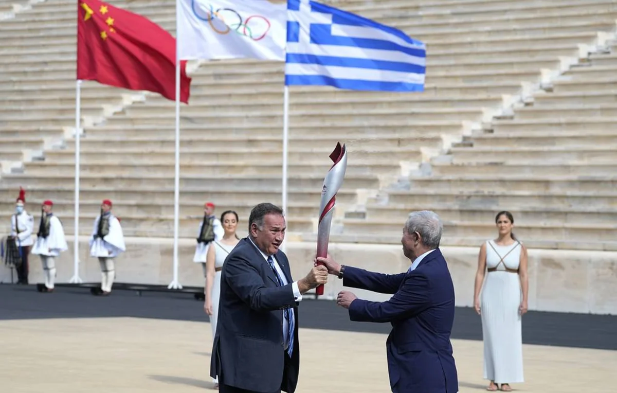 Qış Olimpiya Oyunlarının məşəli təşkilatçılara təhvil verilib