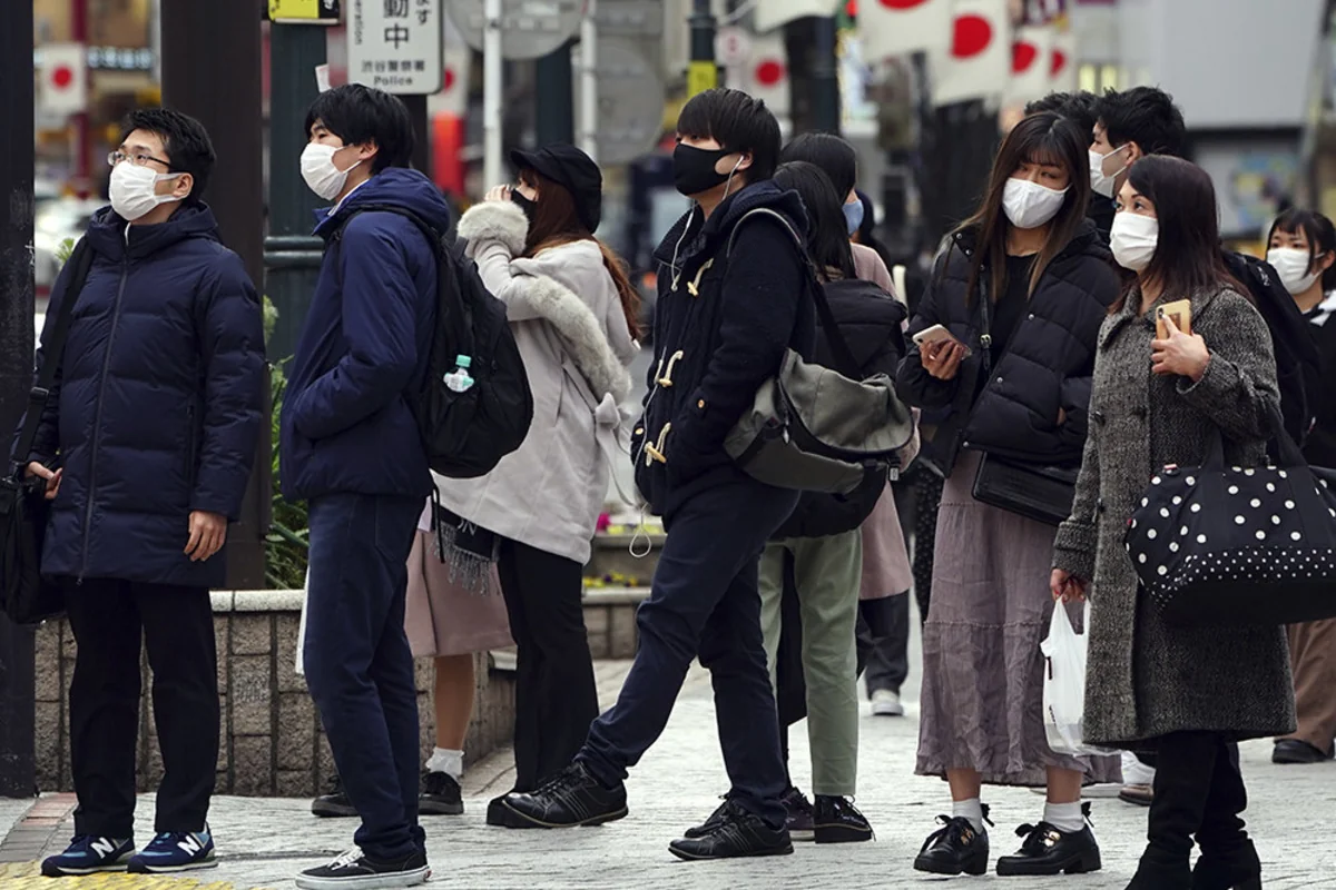 Japan's daily COVID cases top 50,000