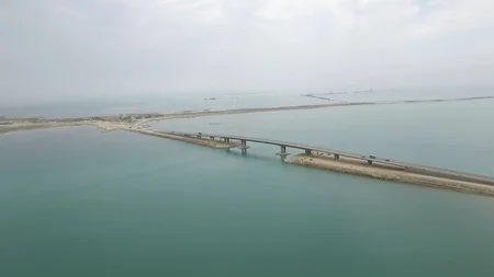 President Ilham Aliyev inaugurates a new bridge in Pirallahi settlement
