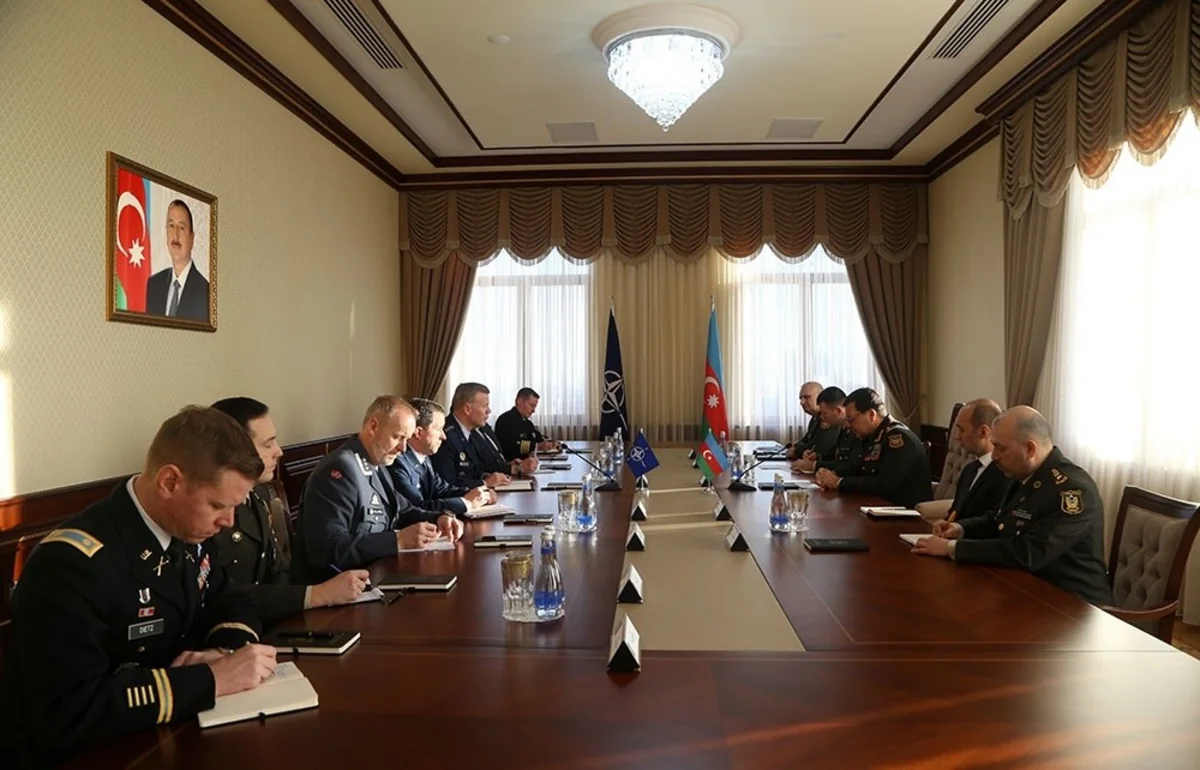 Najmeddin Sadikov meets with US General