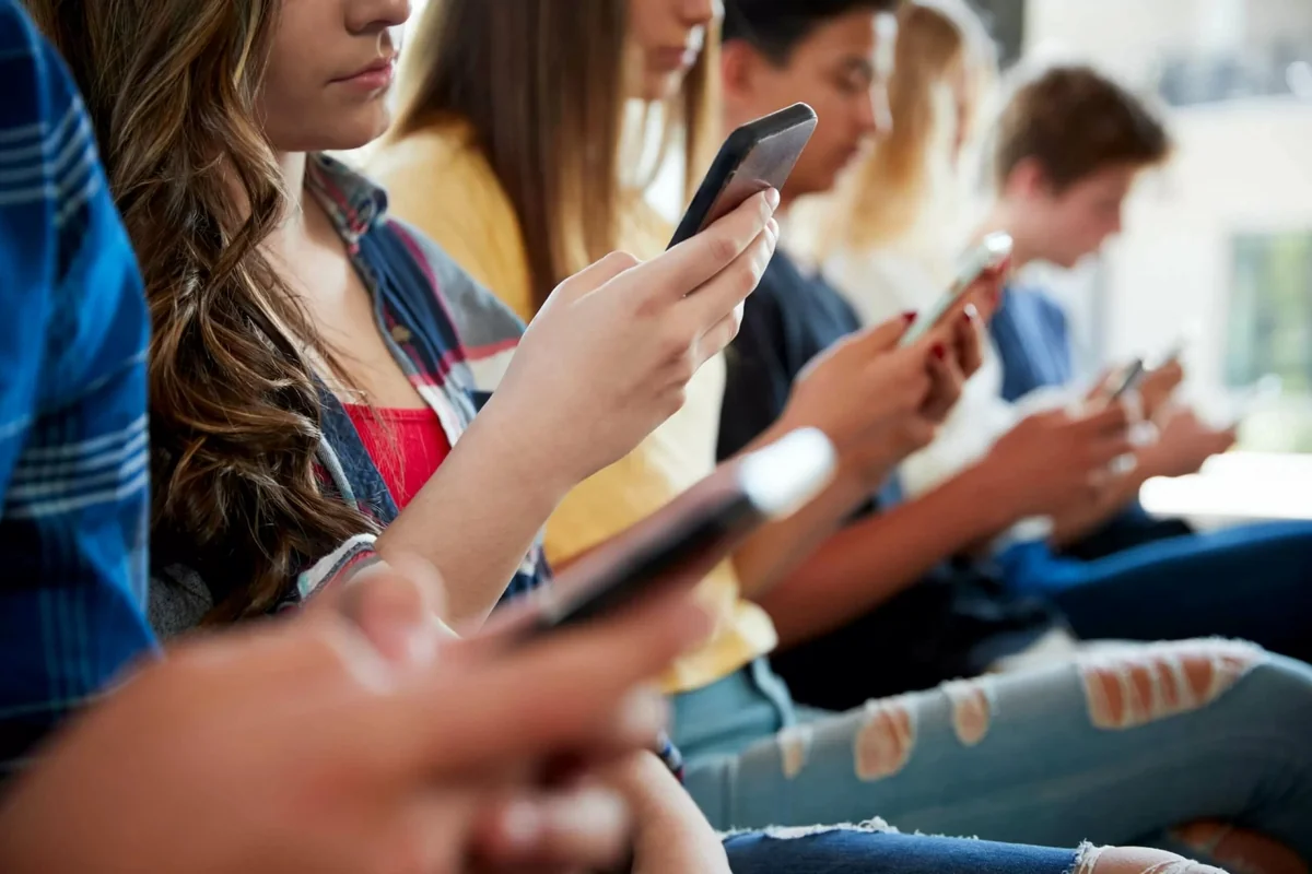 Ministers confirm plan to ban use of mobile phones in schools in England
