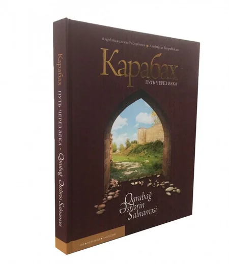 “Report”un əməkdaşı Rusiya XİN-in nümayəndəsinə Dağlıq Qarabağ barəsində kitab təqdim edib