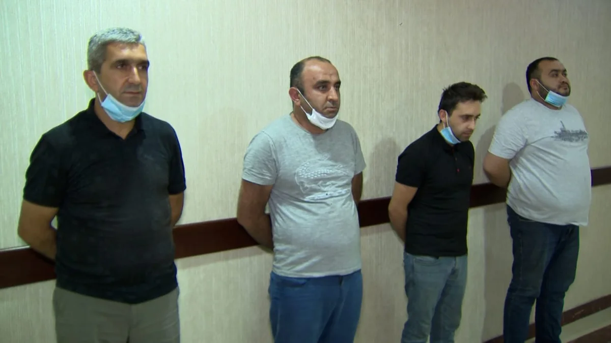 Saxta spirtli içkilər hazırlayan ata və oğuldan ibarət dəstə üzvləri tutulub - VİDEO