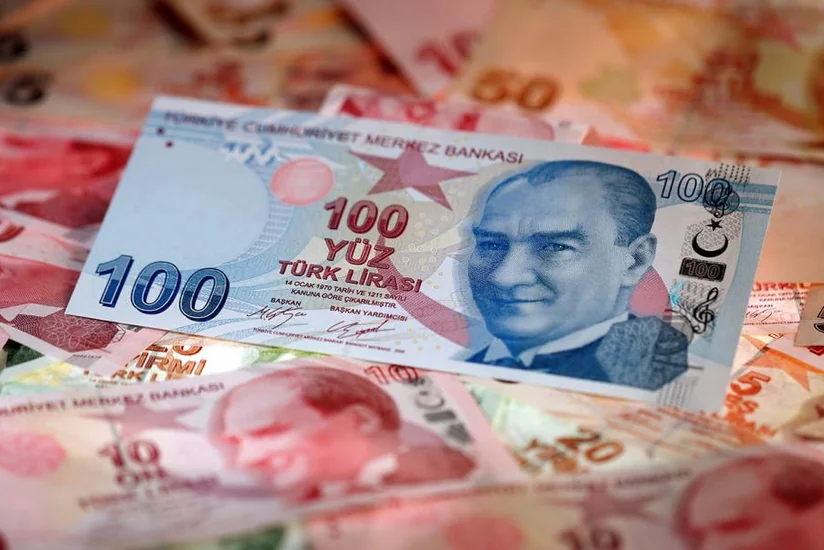 Turkish lira hits record low on central bank's decision on rate