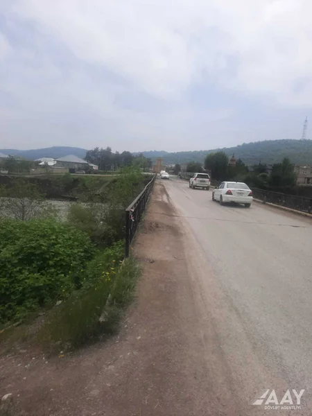 Qubada sel sularının qəzalı vəziyyətə saldığı körpü bərpa olunub