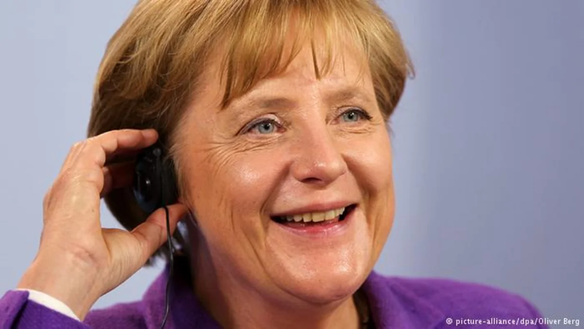 Angela Merkel İrana dair sazişi dərhal həyata keçirməyə çağırıb