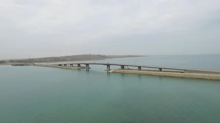 President Ilham Aliyev inaugurates a new bridge in Pirallahi settlement