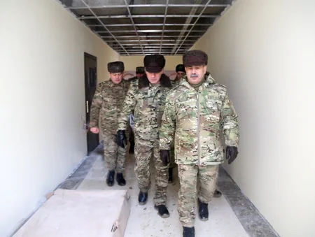 Zakir Hasanov inspects military facilities under construction and major repair