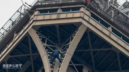 Eyfel qülləsinə dırmaşan naməlum şəxs tarixi abidədən düşürdülüb - FOTO - YENİLƏNİB-2