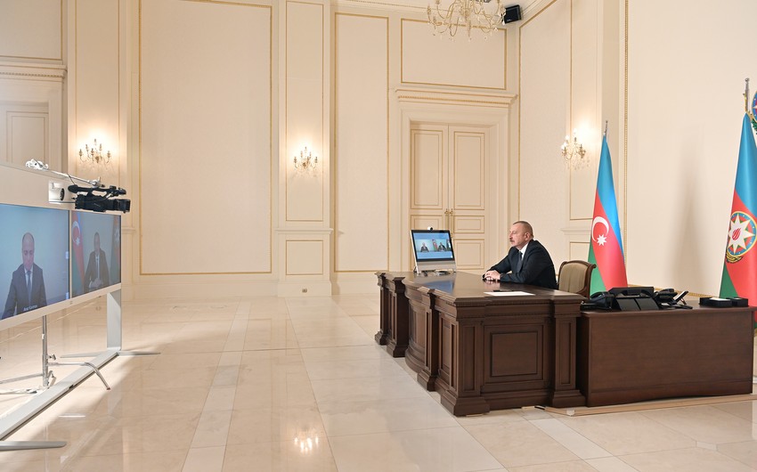 President Ilham Aliyev receives in a video format Anar Karimov
