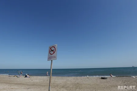 Qadağan olunan çimərlikdə dincələnlər - REPORTAJ