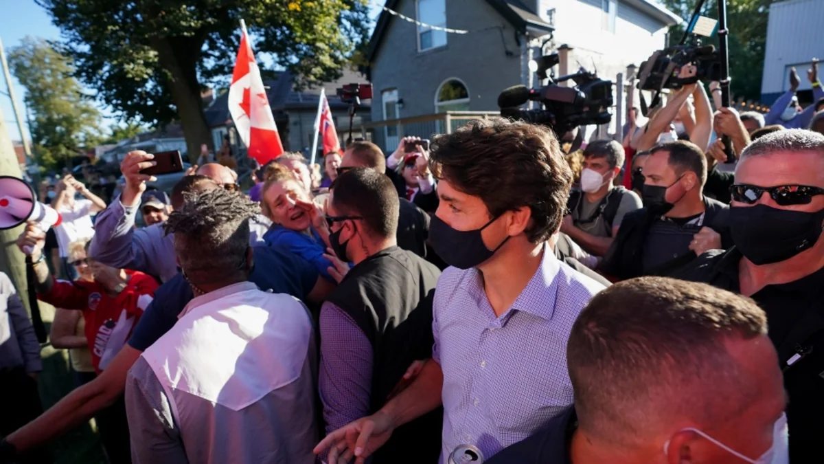 Protesters throw gravel at Canada's PM during pre-election rally