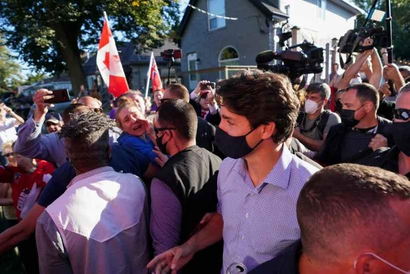 Protesters throw gravel at Canada's PM during pre-election rally