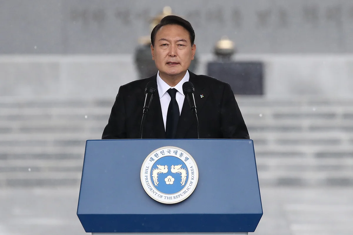 South Korea's impeached president gets pay rise while still resisting arrest