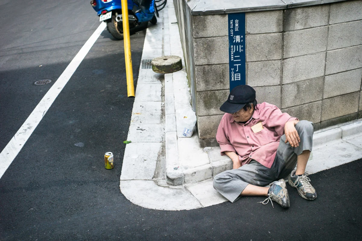 Japanese police ask drinkers to stop sleeping in street